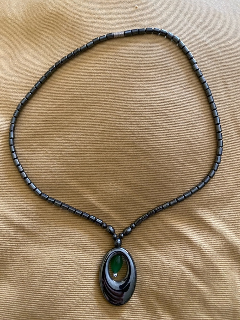 Hematite Beaded Necklace with Green Oval Pendant